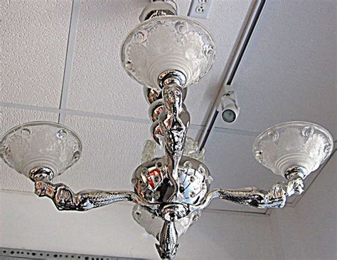 Like the mermaid chandelier here are realy awsome~. French Art Deco Petitot Mermaid Chandelier at 1stdibs