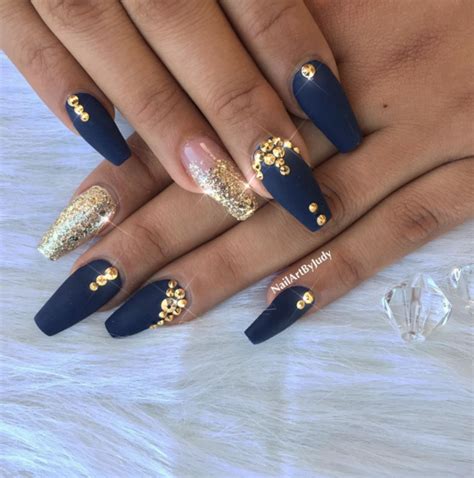 This is definitely a more brave. Trend Spotting: Navy Blue | Gold acrylic nails, Gold nails, Blue gold nails