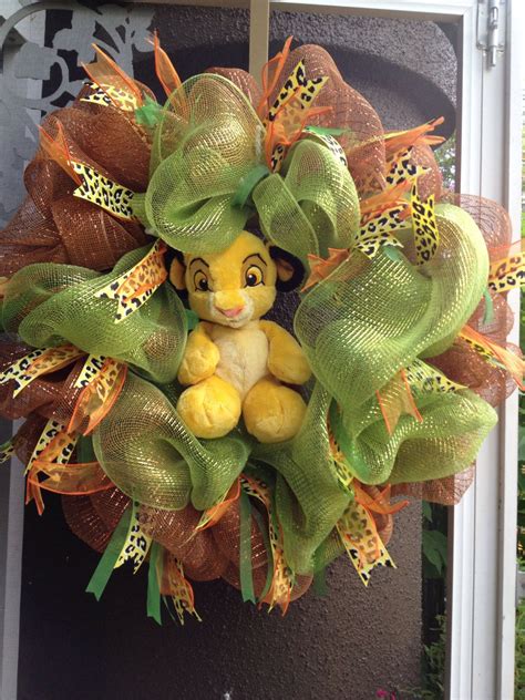 Lion king baby shower centerpieces. Simba the lion king deco mesh wreath by italywest on Etsy ...