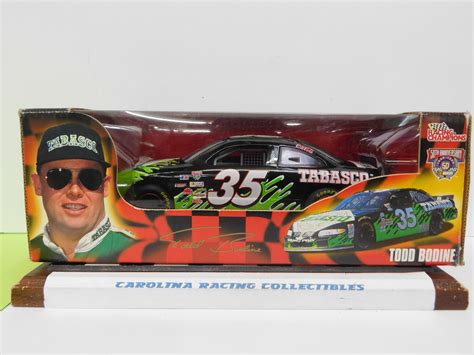 Volkswagen vw golf gti mk5 model car 1 43 scale black mark five mkv cararama k8. Todd Bodine 1/24 #35 Tabasco (Green & Black) 1998 Pontiac ...