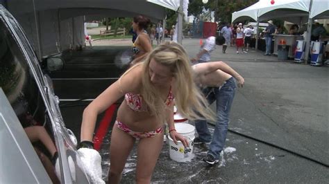 The car is going to crash into the wall. Hot Bikini Babes: Bikini Car Wash