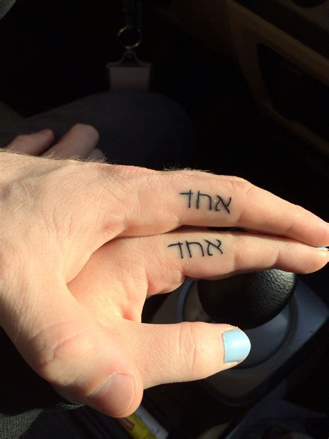 All these given tattoo designs depict amazing messages and they look exceptionally cool and classy. Me and the hubby's tattoos. Hebrew for "Echad", meaning ...