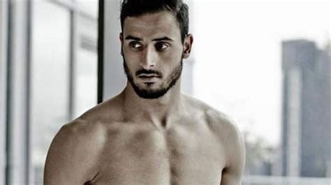 Does nacer chadli have tattoos? Nacer Chadli nu pour lutter contre le cancer