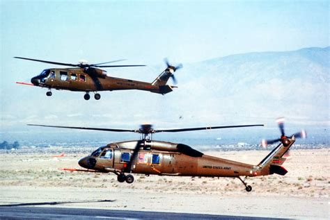 The mounts were provided with the. File:Sikorsky YUH-60A and Boeing Vertol YUH-61A flyoff.jpg ...