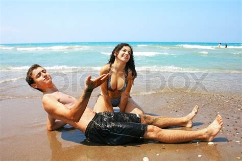 Having fun in the bedroom. Teens having fun on the beach | Stock Photo | Colourbox