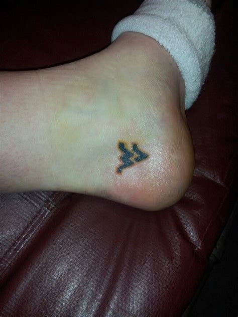 West virginia tattoo done by brad walker in princeton west virginia at asylum tattoo. West Virginia University (WVU) tattoo on my foot ...