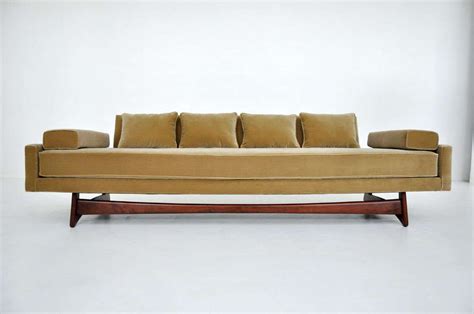 We design to stand out, to make our clients and their products stand out. Gondola sofa by Adrian Pearsall. Newly upholstered in ...