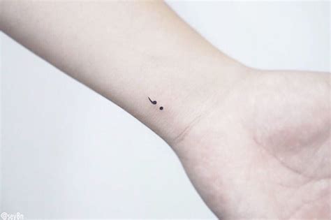 Black semicolon tattoos on wrists. Tiny Semicolon on the Wrist Tattoo by Seyoon