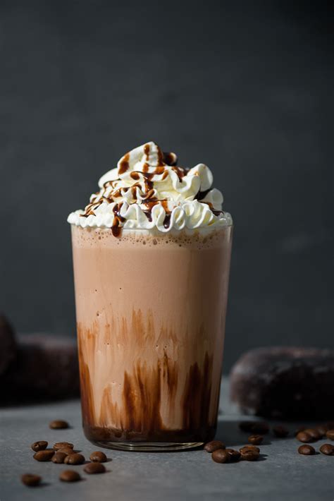 In a blender, add the ice, the instant espresso powder, the chocolate syrup, the vanilla extract and the milk. Double Chocolate Blended Iced Mocha - Fork Knife Swoon