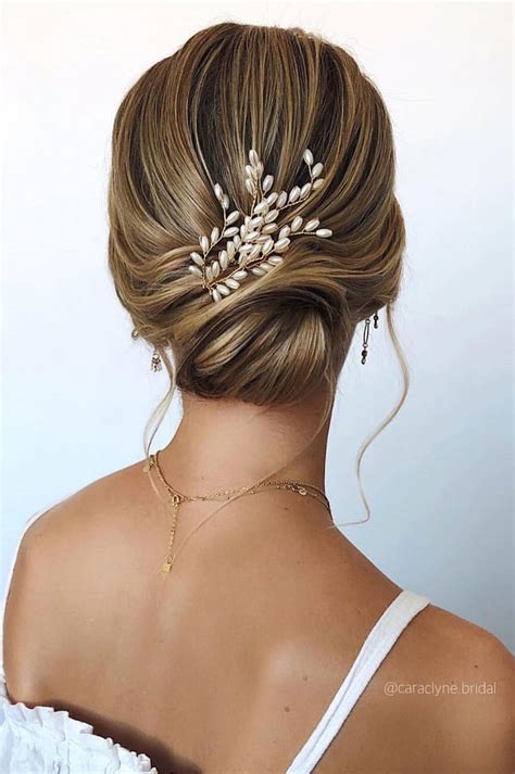 Gather hair into a low ponytail, and then use a sock bun tool to get the perfect doughnut look for short wedding hairstyles for guests? 100 Prettiest Wedding Hairstyles For Ceremony & Reception ...