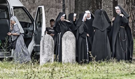 A nun is a woman who has taken special vows and dedicated her life to the service of the church and its people. A Nun Event | Rome - Italy | Roi | Flickr