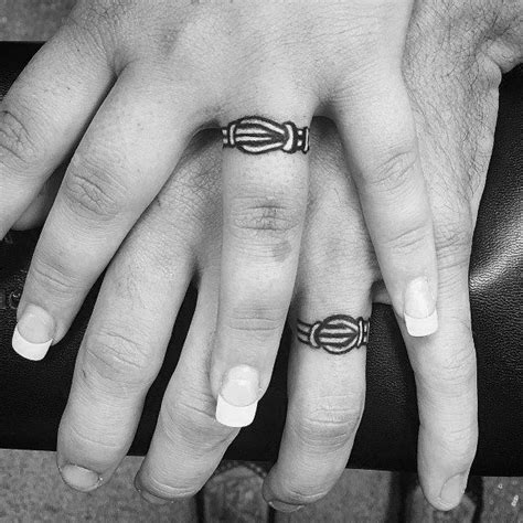 Here's everything you need to know about wedding ring tattoos (plus 40 pictures of ring finger tats to inspire your own ink band!). Top 81 Couples Tattoos Ideas [2020 Inspiration Guide ...