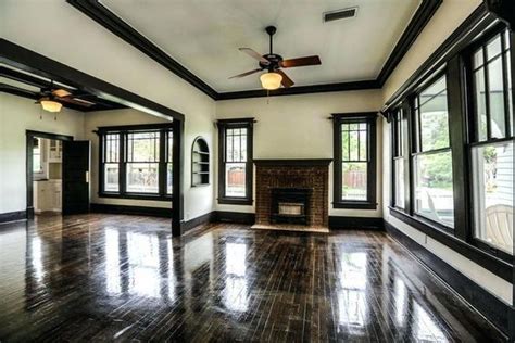 It is also used atop doors, windows, pilasters and cabinets. creamy walls, dark trim in 2020 | Black trim interior ...