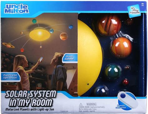 This ceiling mobile is one of our favorite features of the planet themed nursery. Uncle Milton Light Up Solar System Mobile | 42499020558 ...