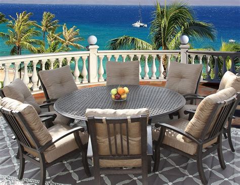 This 7 piece teak wood castle patio dining set includes round to oval extension table, 2 arm chairs and 4 side chairs with cushions. 8 Person Round Outdoor Dining Table | Round patio table ...