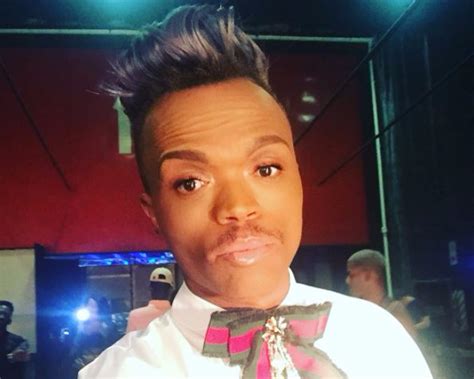 The media personality posed with the uniform, in expensive shoes next to his expensive car Wuuu Shem! Somizi weighs in on Emtee's manhood mishap