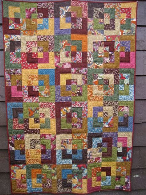 Log cabin quilts are a traditional favorite that get a whole lot easier to sew with the help of log cabin foundation papers! quarter log cabin | Log cabin quilt pattern, Log cabin ...