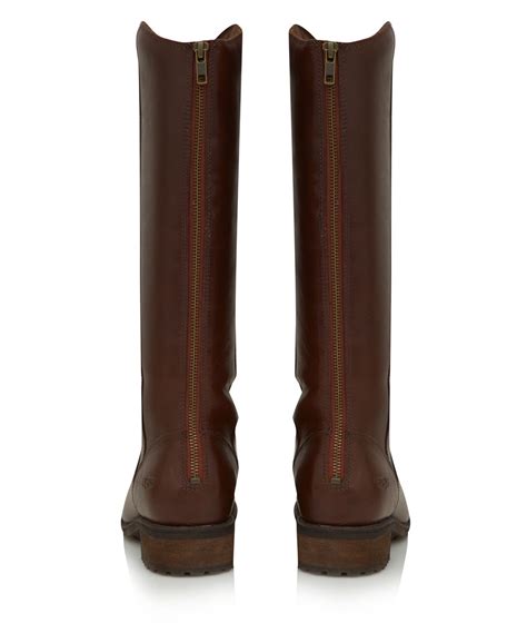 From leather knee high boots to flat boots browse our extensive collection and find your match. UGG Brown Leather Seldon Flat Knee High Boots in Brown - Lyst