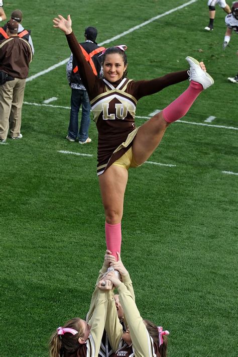 Owing to a combination of anatomical factors and the tightness of the fabric covering the area, the crotch and mons pubis may display a shape resembling the forefoot of a camel. Cheerleader does leg-lift formation - a photo on Flickriver