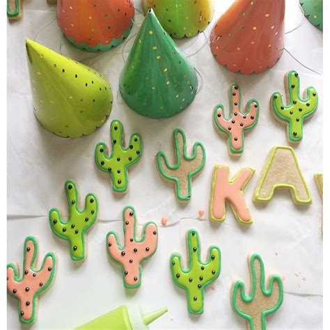 People seem intent on remaking all their everyday objects in the image of the cactus. Working on some cute lil cactus cookies for a very a hot ...