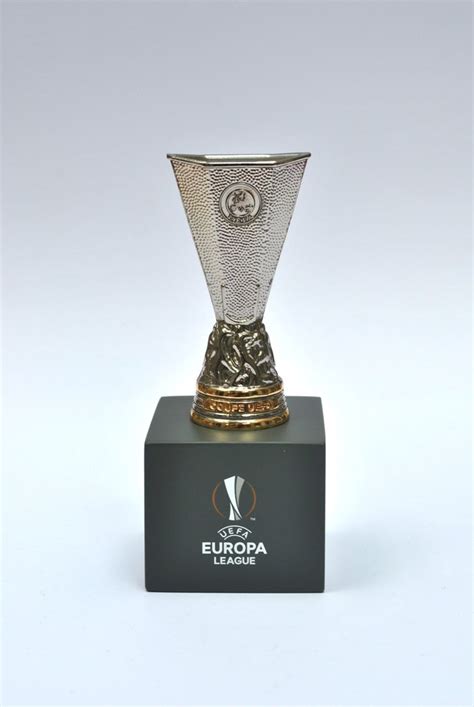 Ucl trophy silhouette, sign of club on the screen in. UEFA Europa League Mini Replica Trophy