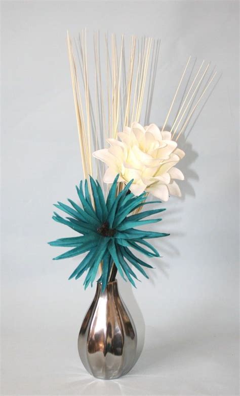 It is finished with abstract pattern. Artificial Flowers - Teal & Cream Silk Flower Arrangement ...