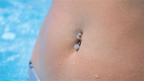 What body piercing is most likely to get infected? What Is a Belly or Navel Piercing? - Howcast