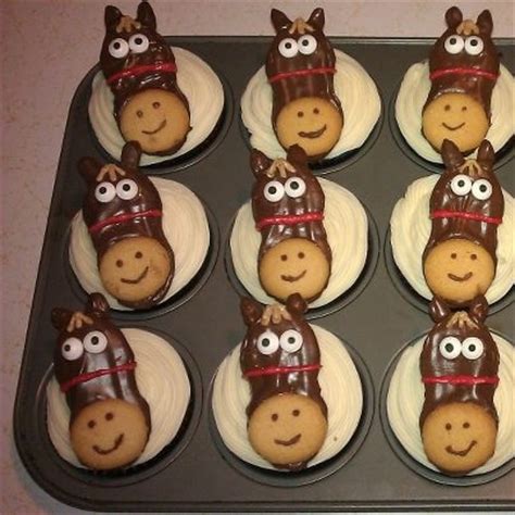 These chocolate nutter butter cupcakes are a dream come true. Horse cupcakes. Nutter Butter cookies dipped in chocolate ...