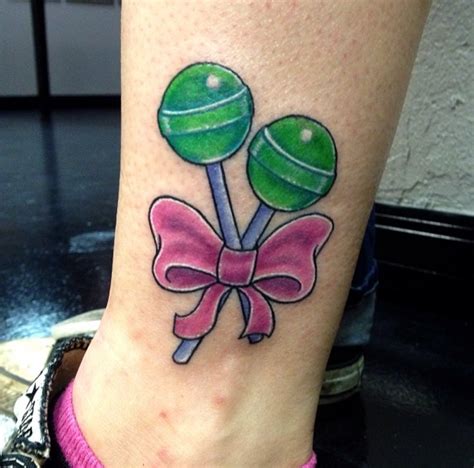 Lollipops tattoo and piercing, oneonta, new york. Lollipop Tattoos - Inked Magazine - Tattoo Ideas, Artists ...