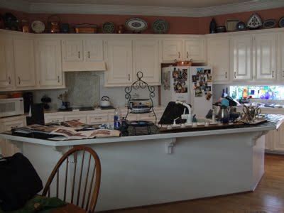 Pagesbusinessesreal estateniblock homesvideos10 foot ceilings, 8 foot doors, and a craftsman inspired look. Kitchen Cabinets to the Ceiling — DESIGNED