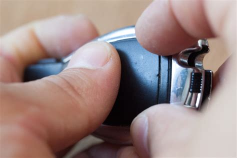 Slide the lever on your key fob to the left and remove the valet key. How to Replace the Car Key Battery in a Mercedes Benz | It ...