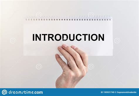 Introduction. Word Text On A Sheet Of Paper. Hand Of Businessman Stock ...