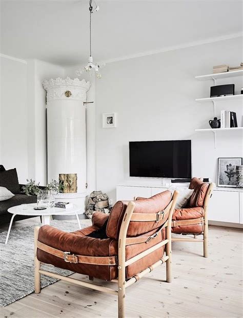 From stationary chairs and accent chairs to those that rock and swivel, we have chairs for every room in your home. Living Room : Soft white with leather chairs via ...