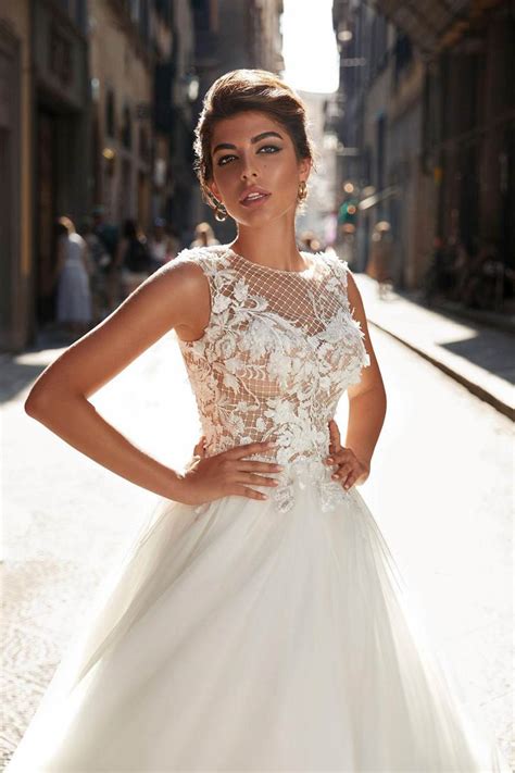 A lace midi dress, a backless blush one or something. Wedding dress Renata 19-009 - Ricca Sposa bridal boutique