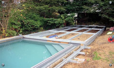 Eine gut gestaltete terrasse ist wie eine oase der ruhe inmitten des geschäftigen stadtlebens. how to cover your pool with a deck on wheels | Poolabdeckung, Gartenpools, Pool