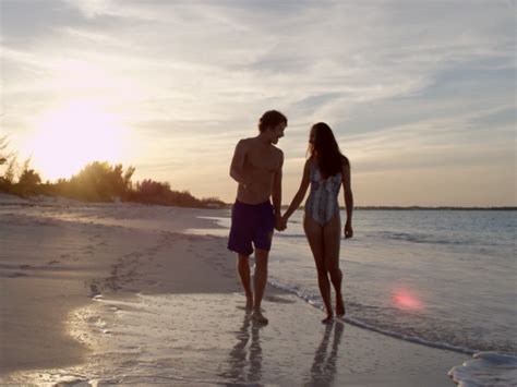 Please tell us why you are reporting this video: Beach Romance: Young Couple | Brand Center | myoutislands.com