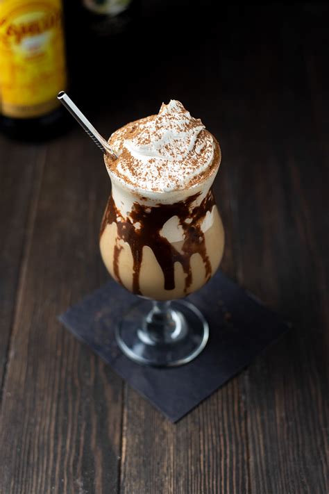 Crush the ice cubes in a blender. Frozen Mudslide Recipe | Kitchen Swagger