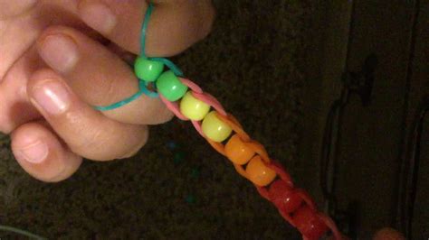 Rubber bands make for sturdy grips and cheap alternatives to some pricey items. How to make bracelets with rubber bands and beads - YouTube