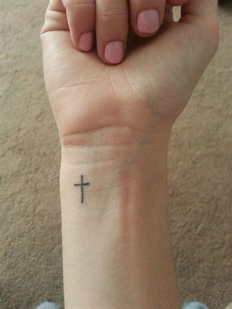 A cross tattoo is one of the most versatile, classic tattoo choices a woman can make. Cross Tattoos on Wrist Designs, Ideas and Meaning ...