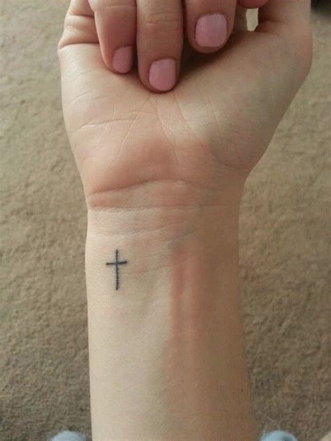 Small cross tattoo on wrist Cross Tattoos on Wrist Designs, Ideas and Meaning ...