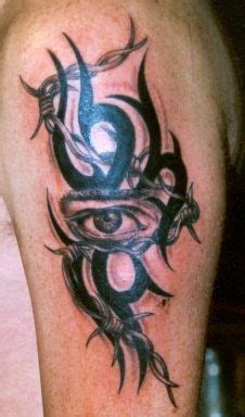 53 traditional panther tattoo flash; Tribal Sign Tattoo With Realistic Eye ~ Tribal Tattoo ...