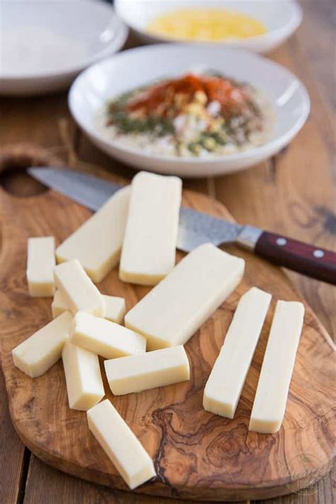 In a small bowl, beat eggs& water. Healthier Baked Mozzarella Sticks • The Healthy Foodie