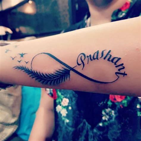 Create a memento your wedding with these beautiful infinity symbol temporary tattoos personalized with the couple's names. 50+ Name Tattoos For Men (2021) - Kids, Wife, Parents