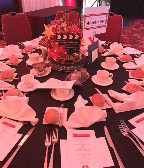Movie night goes glam with hollywood theme party supplies & hollywood party decorations! Hollywood theme gala decorations clapboard | Gala ...