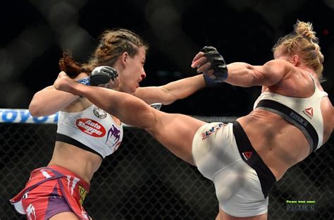 Holm was strong in the first round of the fight standing up. Holly Holm vs Miesha Tate MMA Photo