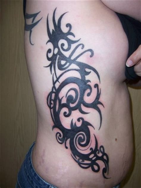 But this simple, tattoo of a line that depicts a wave is perfect on its own. 17 Awesome Tribal Rib Tattoos