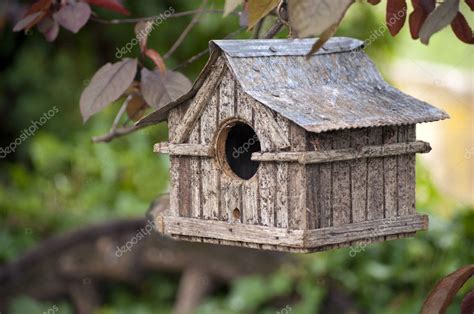 Maybe you would like to learn more about one of these? Pendurado pássaro casa — Stock Photo © jlmcloughlin1 #13774677