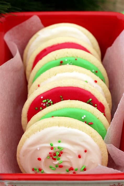 Coat each roll with red or green sugar crystals; Christmas Sugar Cookies with Cream Cheese Frosting - Sweet ...