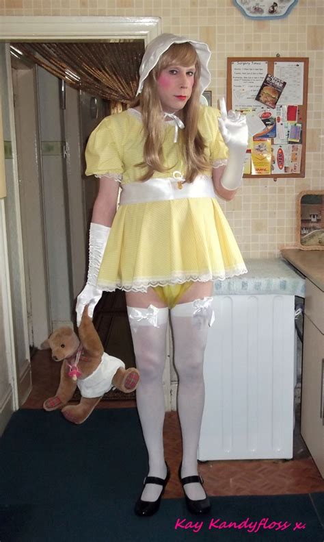 Diaper punishment and changed in a diaper sissy.: Sissy Baby Kay - in yellow and white today.