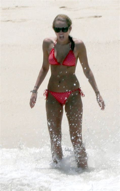 What in the world is happening right now and why is miley cyrus signing queen songs in between final four games? Miley Cyrus: polka dot Bikini Babe; No plan of attending college ~ Mind Relaxing Ideas